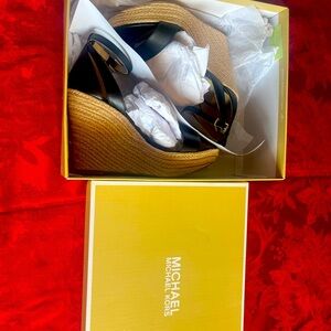 A brand new Michael Kors Platform Sandal. High heel.